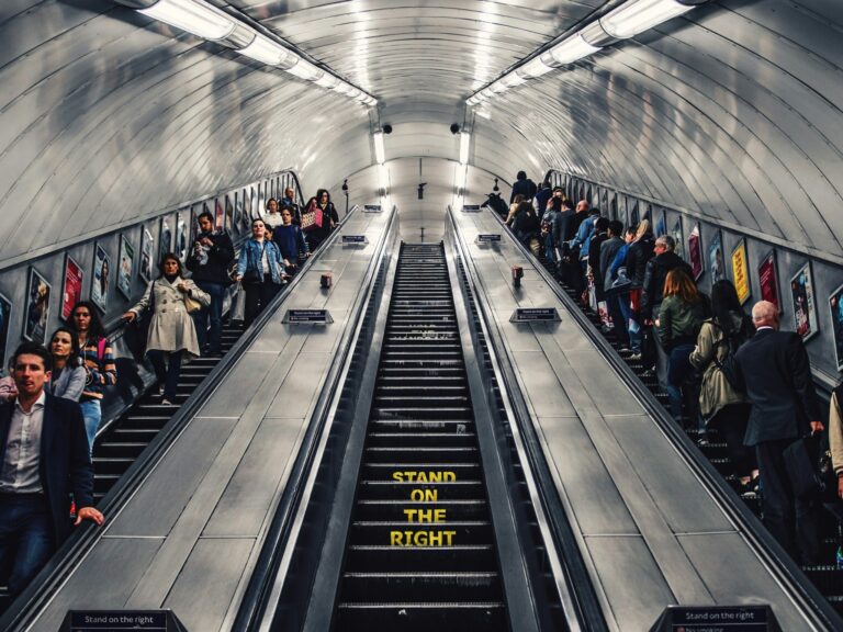 People on London Underground escalato